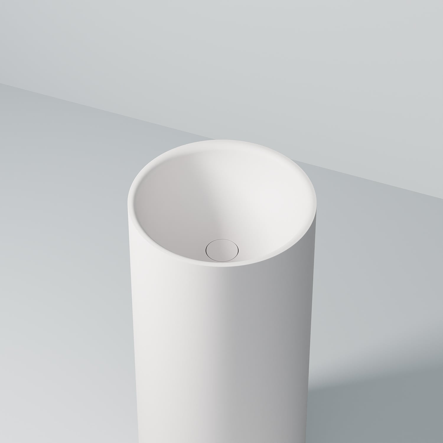 Steinberg Round Solid Surface Floor Standing Washbasin (Matt White 400mm x 890mm)